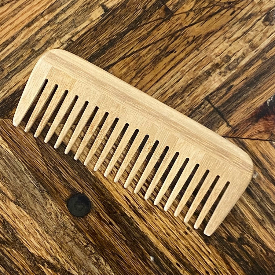 OTB Refills Big Bamboo Comb with wide teeth, natural bamboo hair comb for gentle detangling and scalp massage.