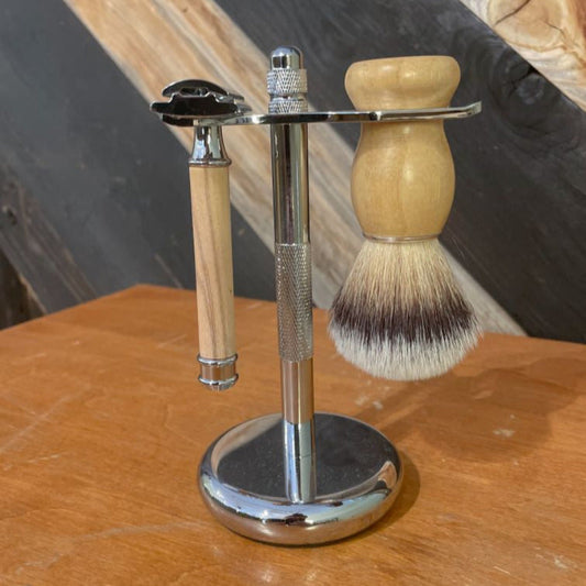 Metal shaving stand for safety razors by OTB Refills, designed to hold and display shaving tools securely.