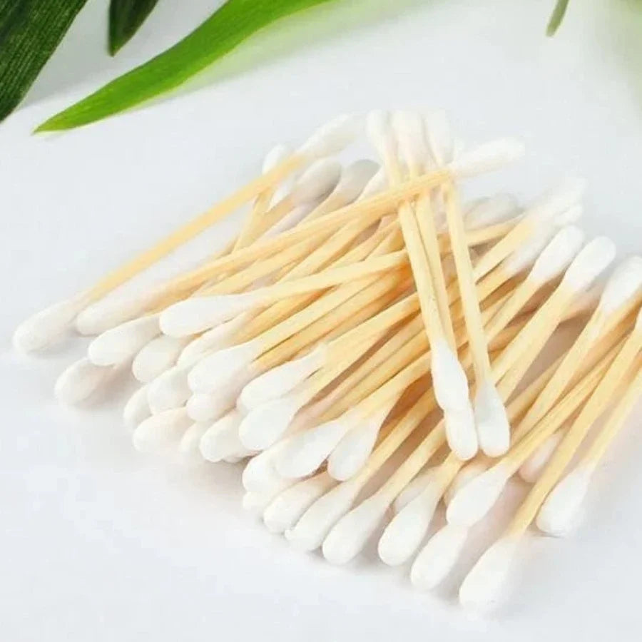 Bamboo and cotton Q-tip swabs by OTB Refills with biodegradable bamboo sticks and soft cotton tips on a neutral background.
