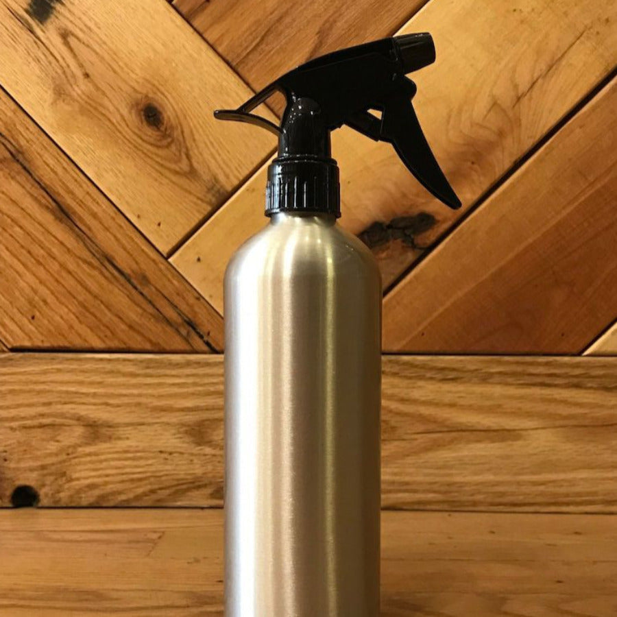 16 oz aluminum spray bottle with trigger sprayer from OTB Refills, featuring a sleek metal design and ergonomic trigger handle.