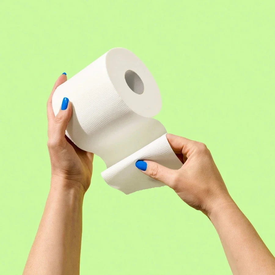 Green bamboo toilet paper roll by Who Gives a Crap with 370 sheets, eco-friendly and soft bathroom tissue.