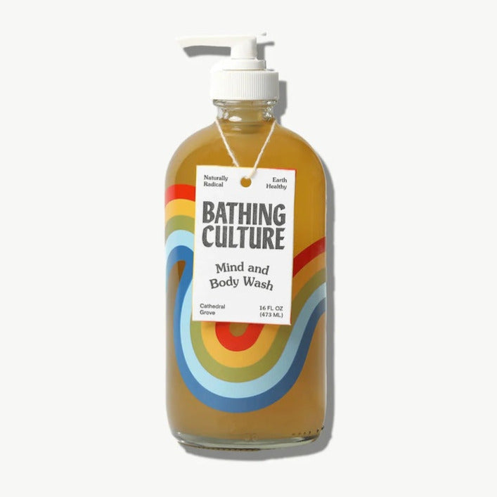 Bathing Culture Mind & Body Wash in a 16 oz glass bottle with a minimalist label and pump dispenser.