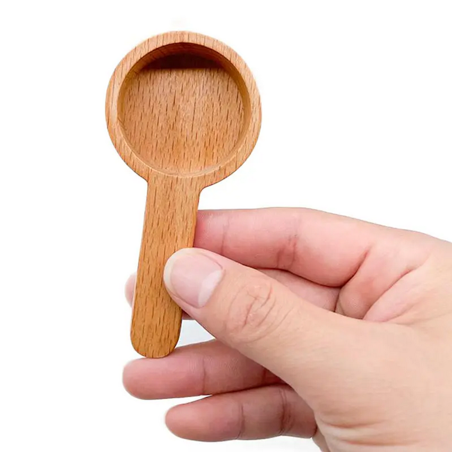 Medium beech wood scoop spoon from OTB Refills, 1 tablespoon capacity, ideal for measuring dry ingredients or refilling containers.