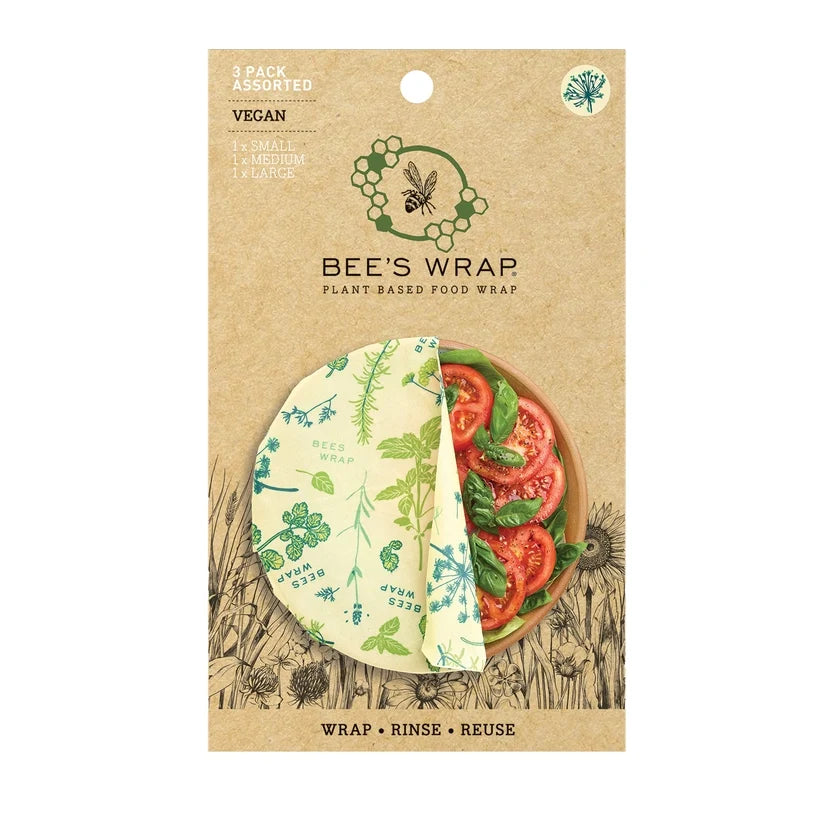 Reusable Bee's Wraps vegan food wraps 3-pack with bees and herbs pattern, made by Bee's Wraps, suitable for covering food containers.