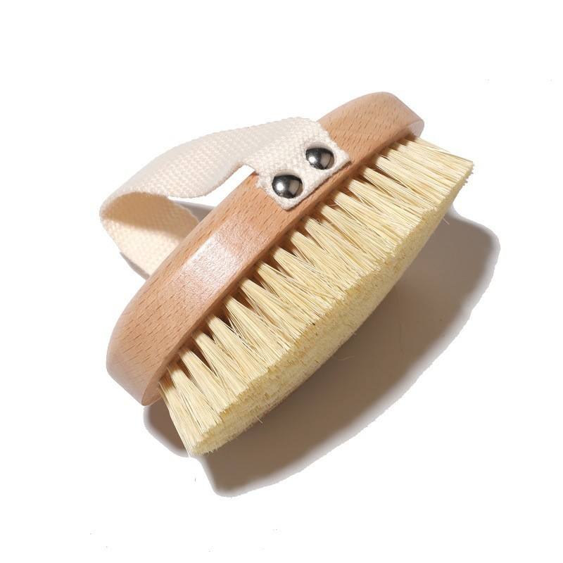OTB Refills beechwood dry brush with natural bristles for skincare and body exfoliation, shown with a wooden handle and bristle detail.