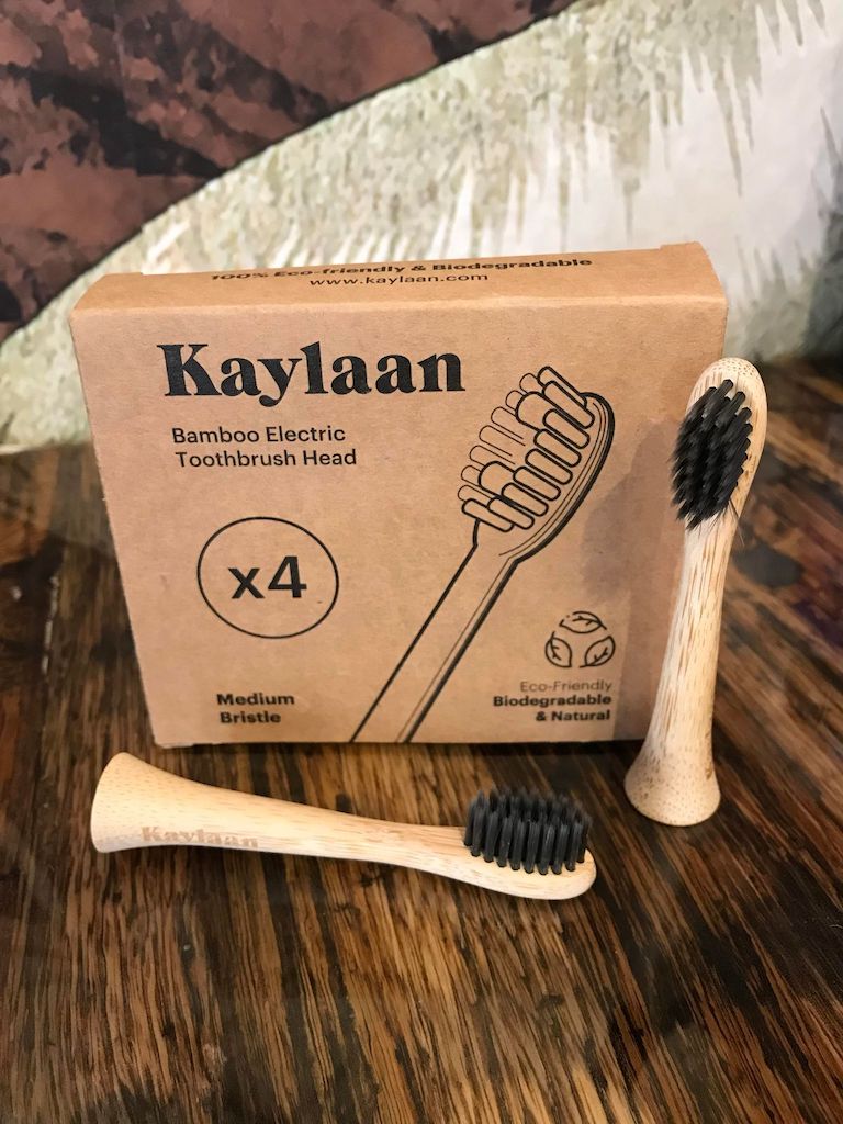 Kaylaan electric toothbrush replacement heads, 4-pack with soft bristles and ergonomic design for effective cleaning and oral hygiene.