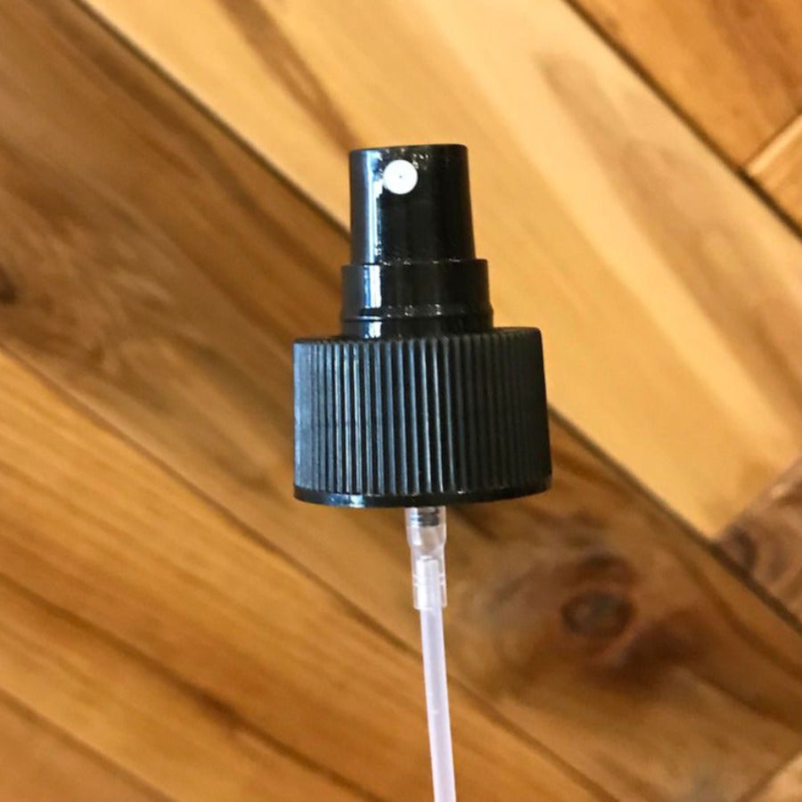 4 oz Fine Mist Sprayer from Premium Vials showing a clear plastic bottle with a spray nozzle and fine mist output