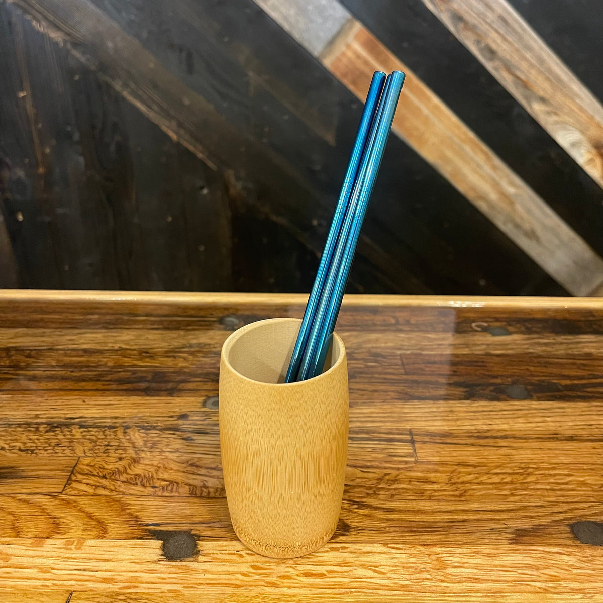 Set of assorted stainless steel straight straws by OTB Refills, showing shiny metallic reusable drinking straws.