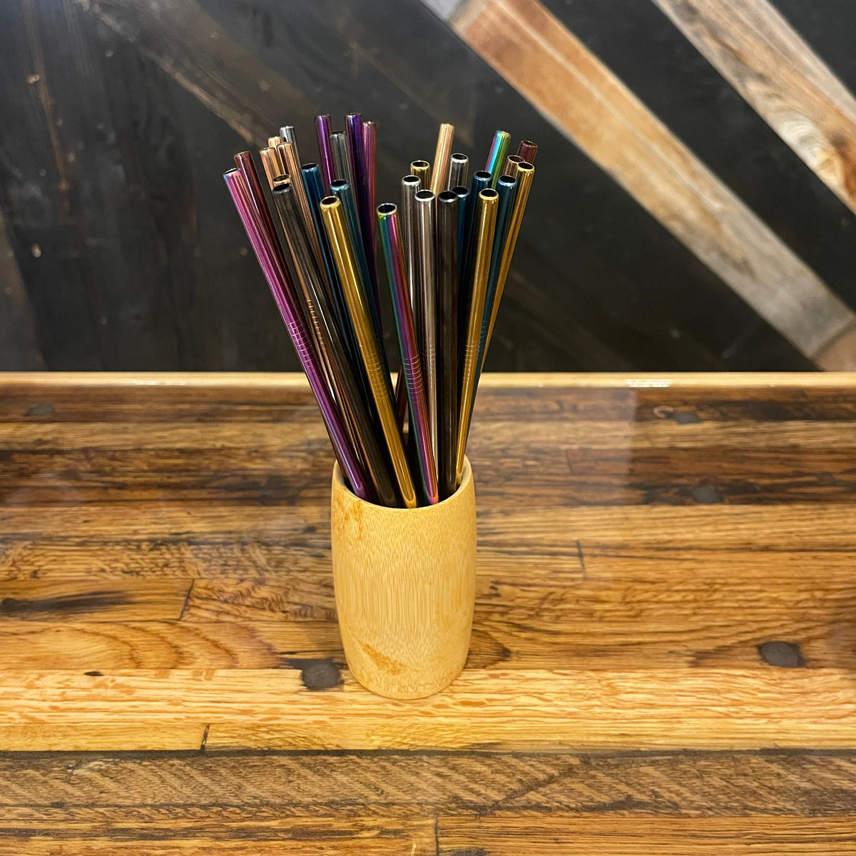 Assorted stainless steel straight straws by OTB Refills, displayed in a set on a neutral background for eco-friendly drinking accessories.
