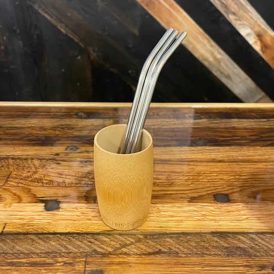 Assorted bent stainless steel straws by OTB Refills, eco-friendly reusable drinking straws on a white background.