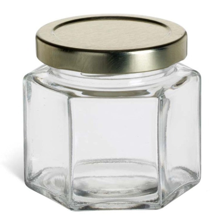 Clear hexagon glass jars by Nakpunar with airtight lids, perfect for storage and organization.
