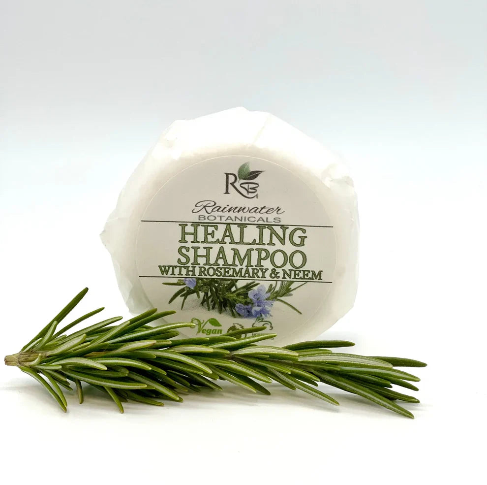 Healing solid shampoo bar by Rainwater Botanicals, zero-waste shampoo product with natural ingredients in eco-friendly packaging.
