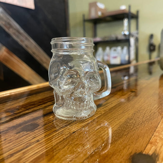 OTB Refills 4oz glass skull mason jar with handle, decorative spooky skull design for storage or display.
