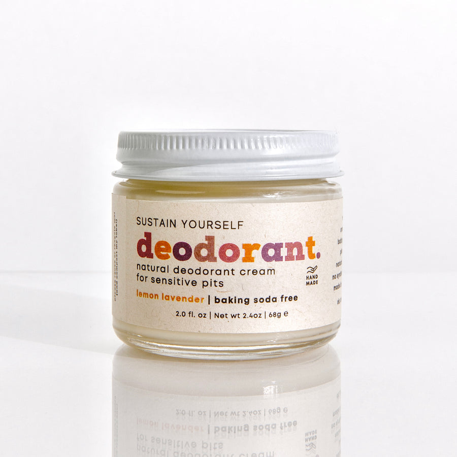 Sustain Yourself deodorant cream in a 2oz glass jar, creamy texture, natural deodorant product on a neutral background.