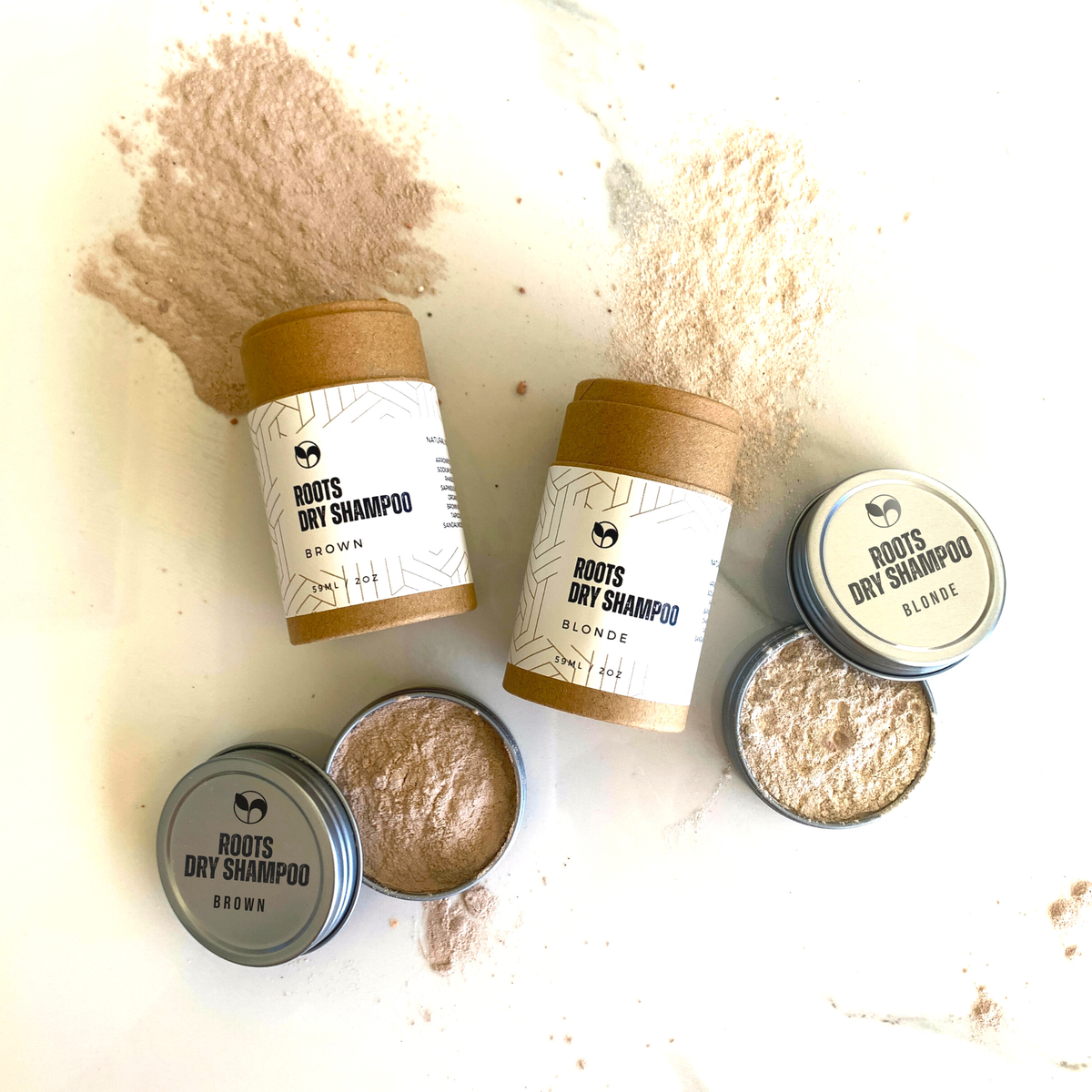 ScentCerae Natural Roots Dry Shampoo 2oz shaker bottle with white cap and clear label showing product details.
