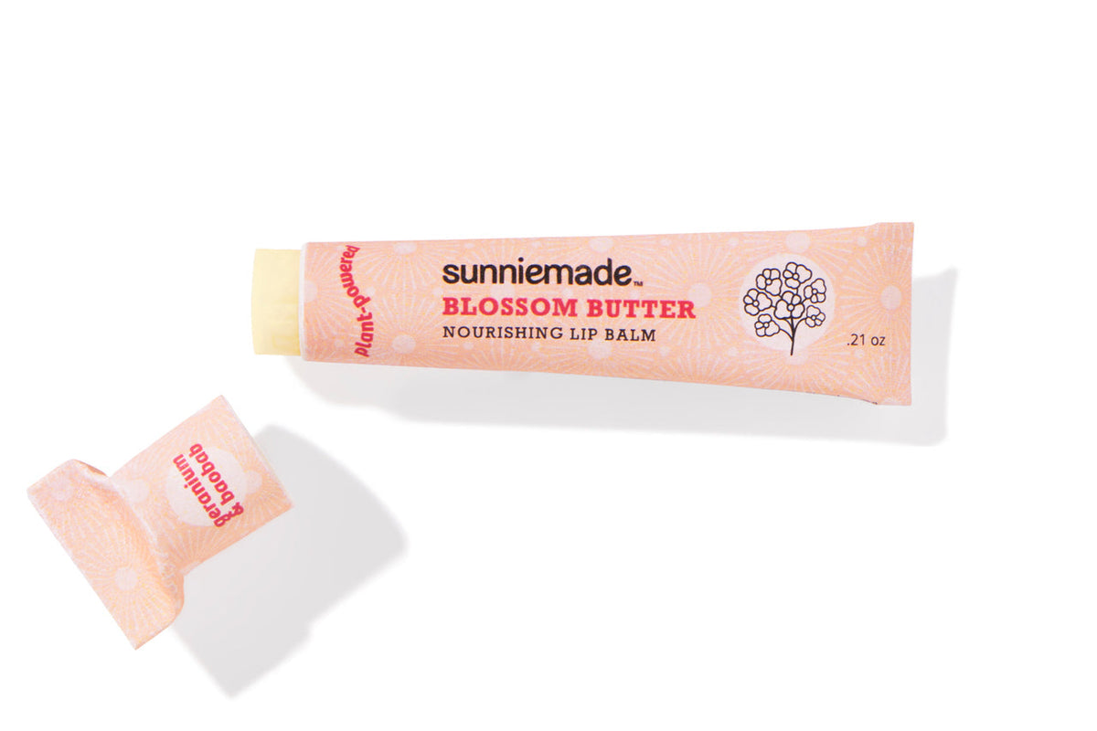 Sunniemade Lip Balm tube with clear packaging and label, displayed on a plain background.