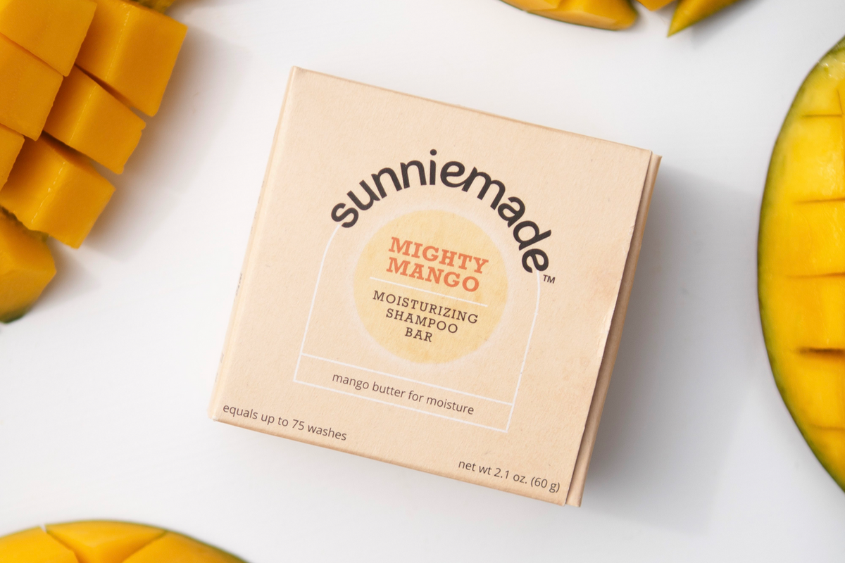 Sunniemade shampoo bar with natural ingredients, shown in a white container, ready for use in eco-friendly hair care.