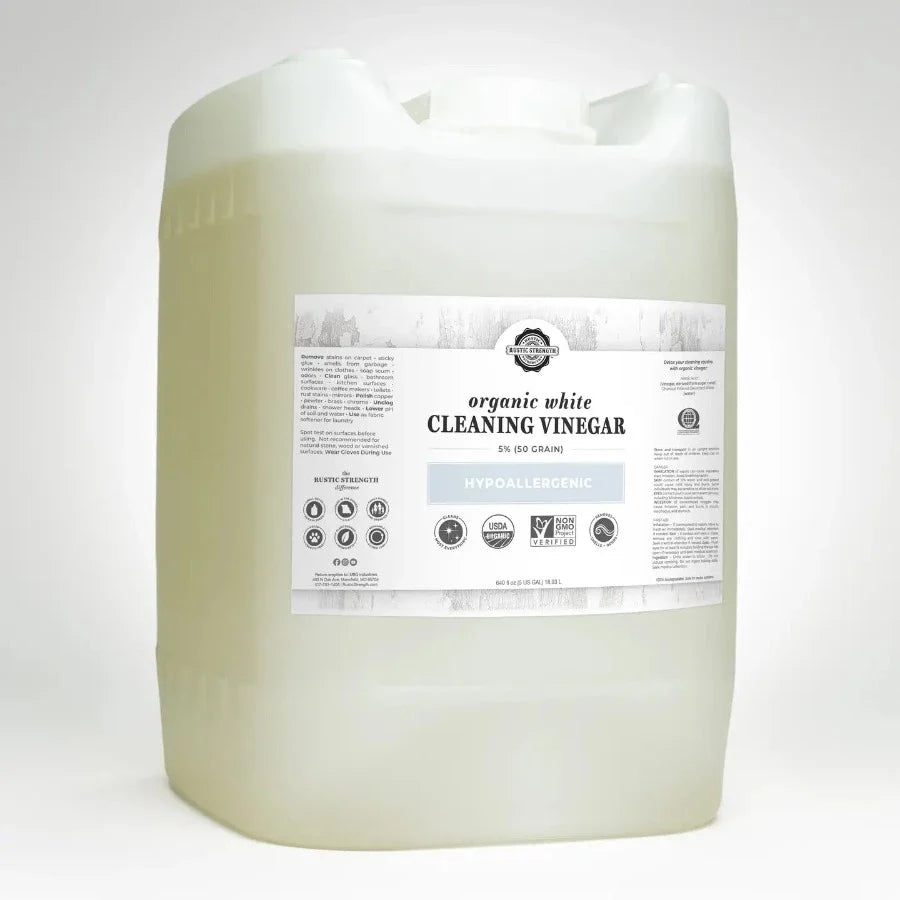 Rustic Strength cleaning vinegar refill bottle with rustic label, 5% acidity, for eco-friendly household cleaning.