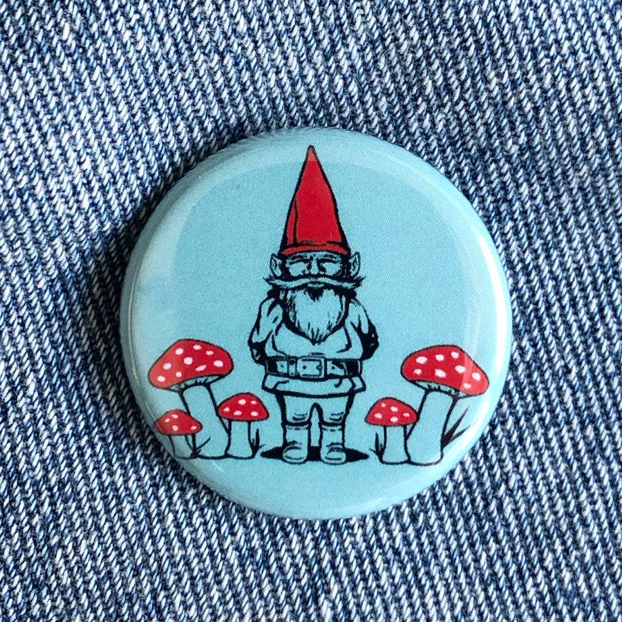 Counter Couture button featuring a stylish design, close-up of the decorative sewing button on fabric.