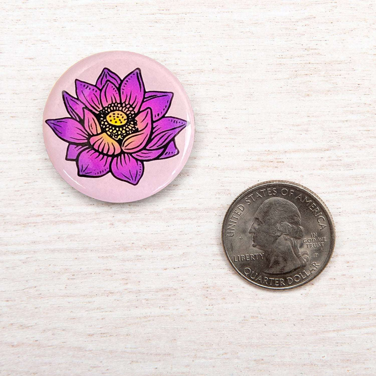 Counter Couture button featuring a sleek, modern design with a polished finish, suitable for fashion and craft projects.