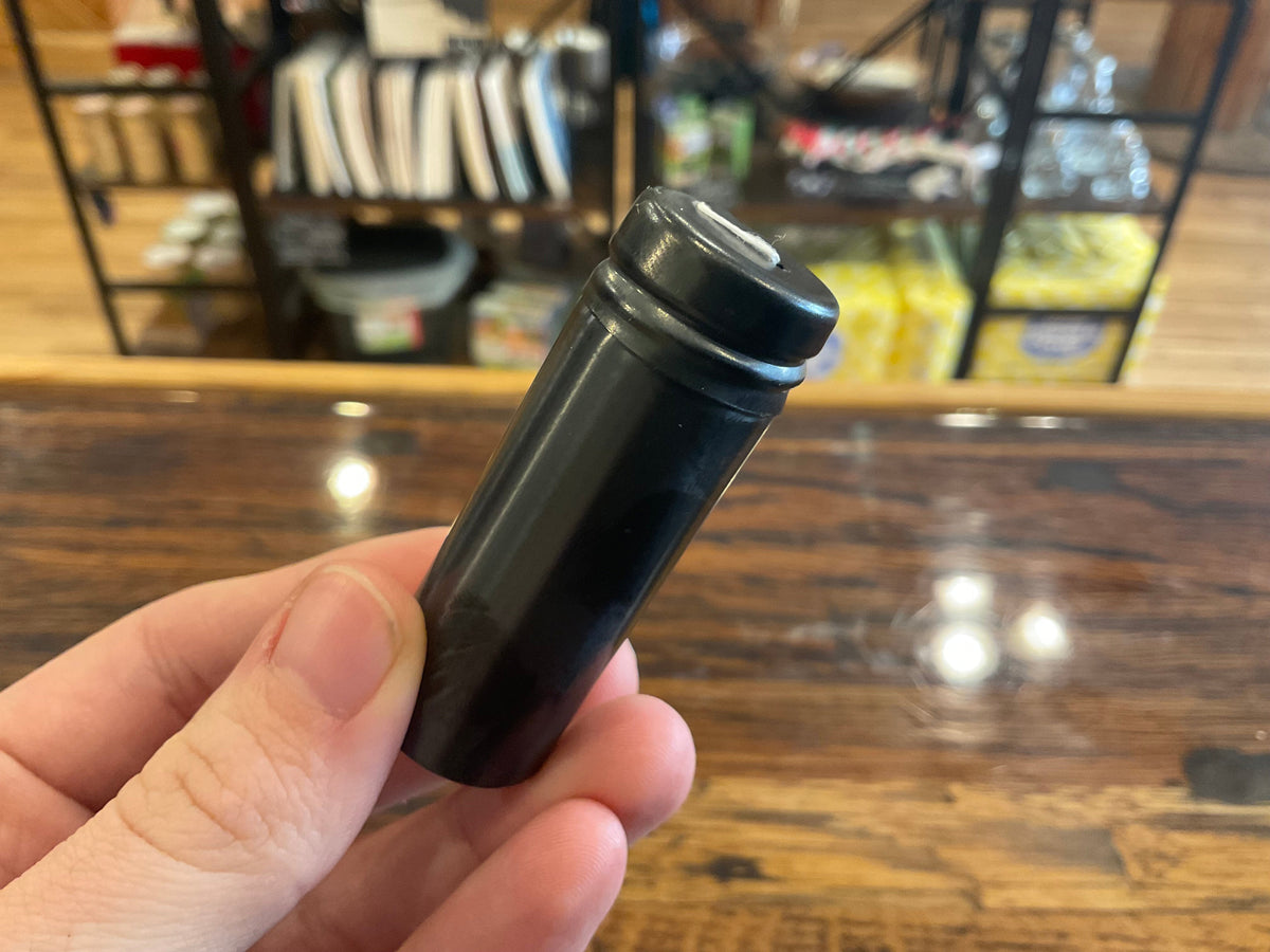 Refillable floss containers from OTB Refills, compact and clear plastic with floss inside, designed for easy portability and use.