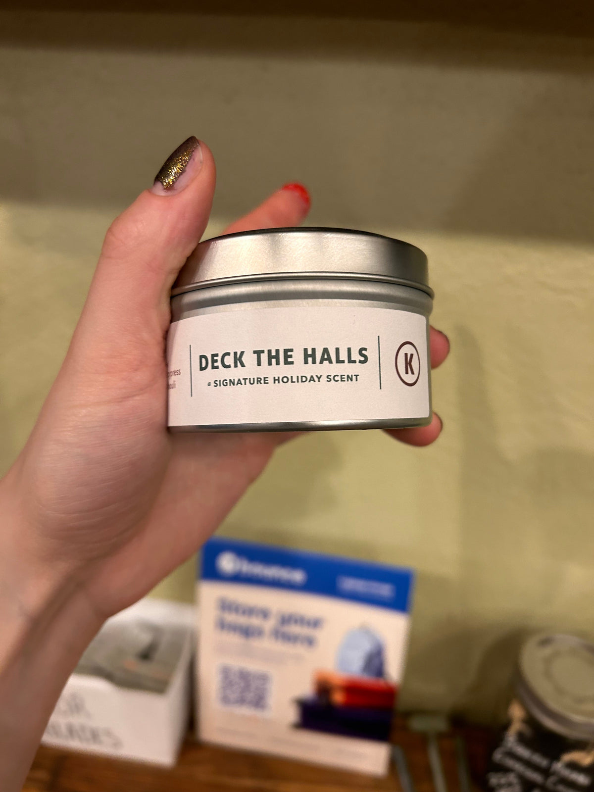 Keystone Inspired 4 oz soy candles in a compact travel tin with a lit wick and warm glow.