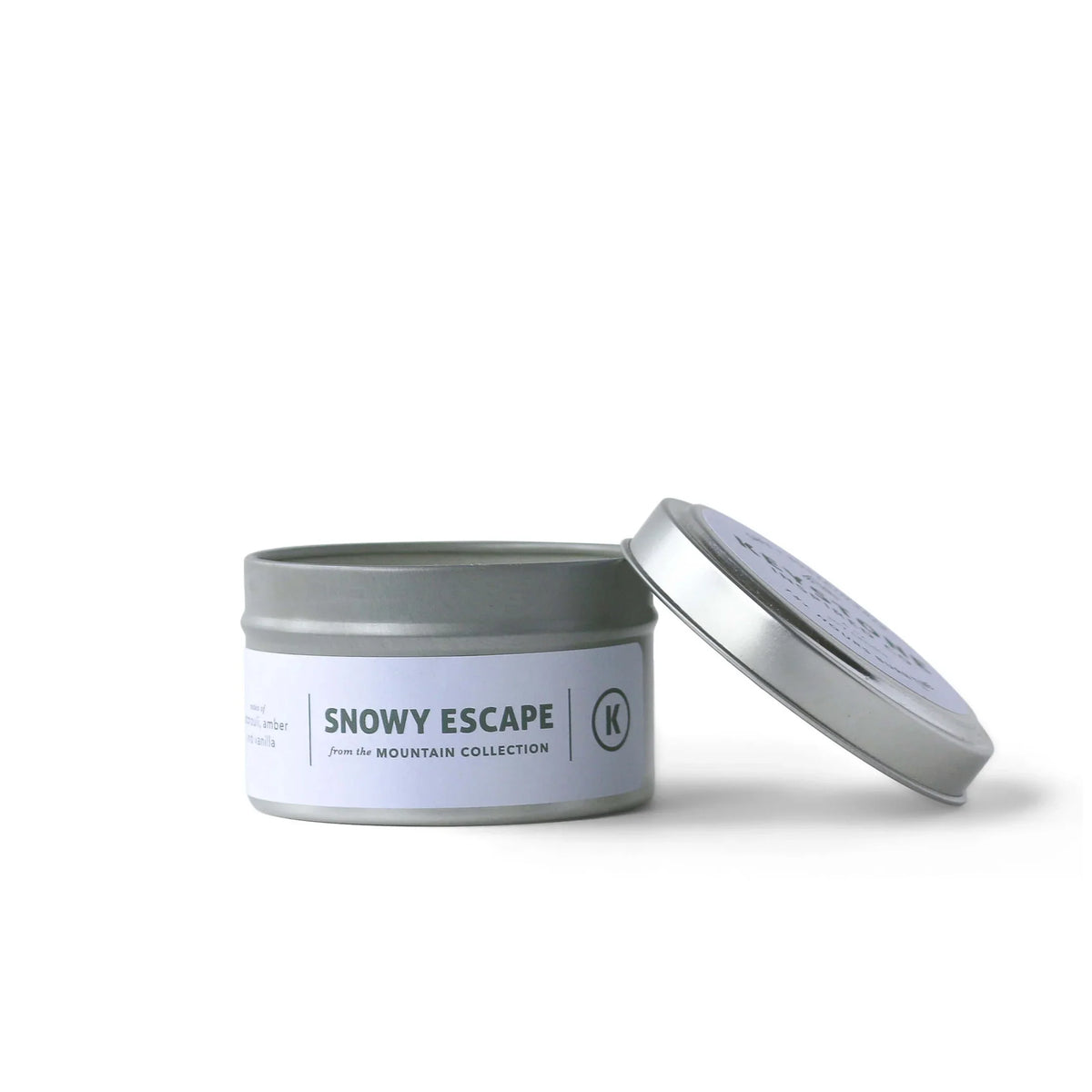4 oz Keystone Inspired soy candles in a travel tin, showcasing a cozy candle with a wooden wick and minimalist label design.