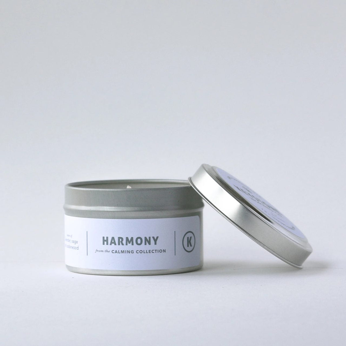 4 oz soy candle in a travel tin by Keystone Inspired, featuring a white wax and minimalist design for cozy ambiance.