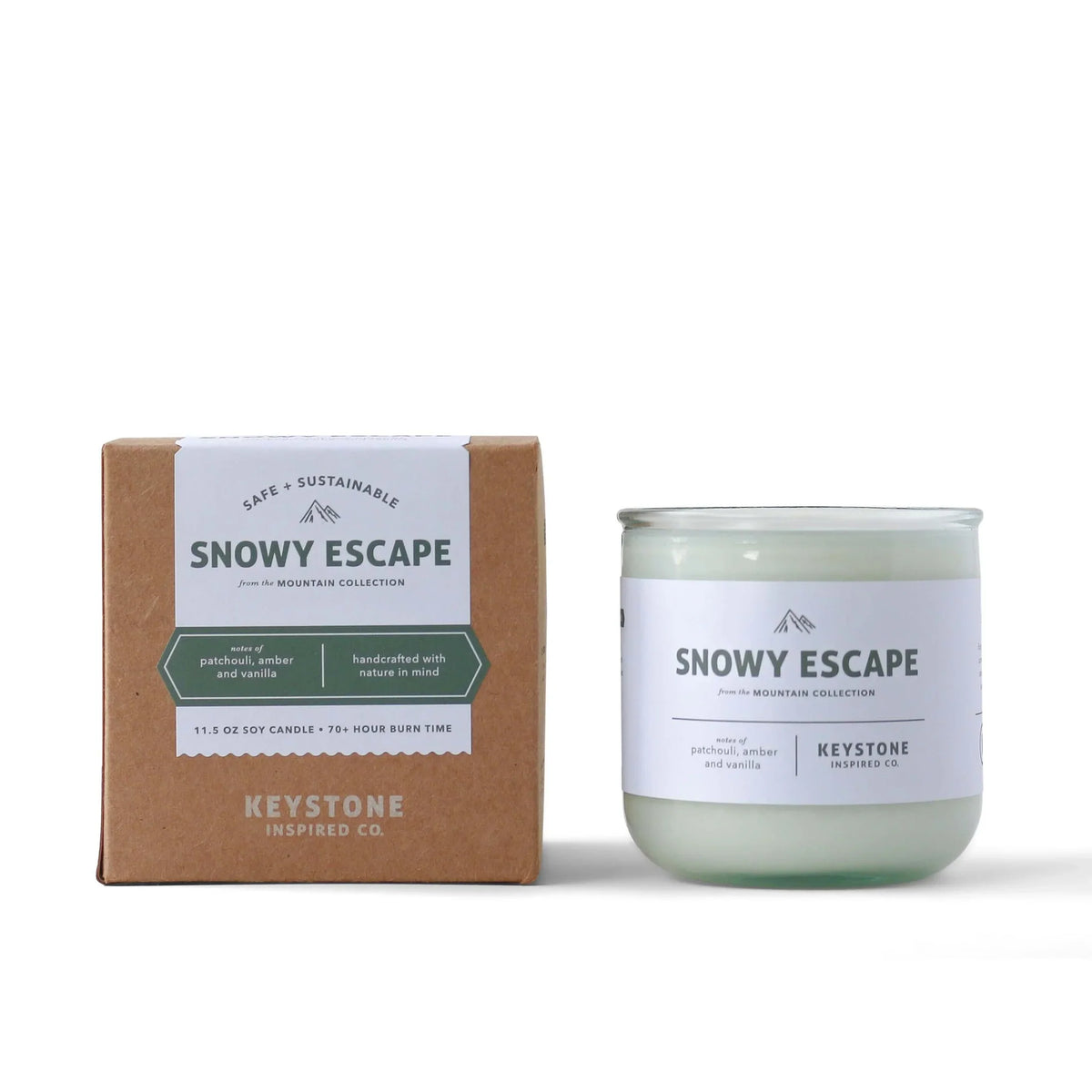 11.5 oz Keystone Inspired soy candle in a clear glass jar with a lit wick, showcasing a cozy and inviting ambiance.