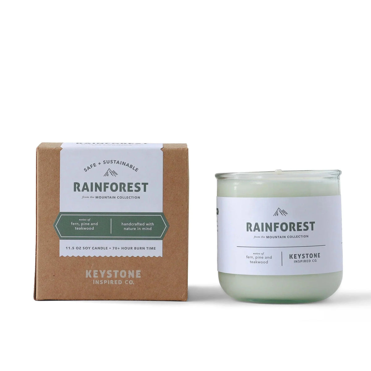 11.5 oz Keystone Inspired soy candle in a clear glass jar, featuring a natural, rustic design and a wick ready for lighting.