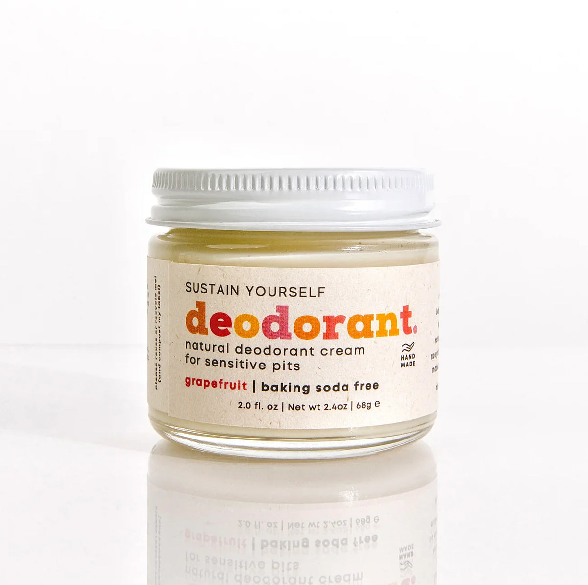 Deodorant cream in a 2oz glass jar by Sustain Yourself, natural deodorant product with a smooth, creamy texture.