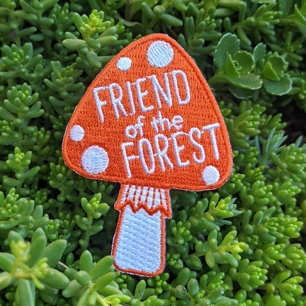 ilikesara Patches displayed on a surface, showcasing various designs and vibrant colors for stylish customization.
