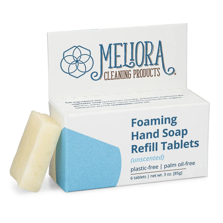 Meliora foaming hand soap refill tablets in a clear container, ready for eco-friendly use and refilling soap dispensers.