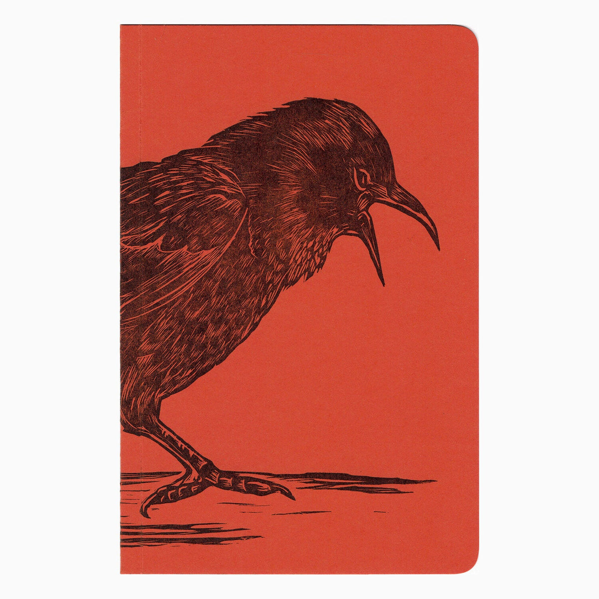 Blackbird Letterpress Jotter Notebook with black cover and visible textured pages, ideal for note-taking and writing.