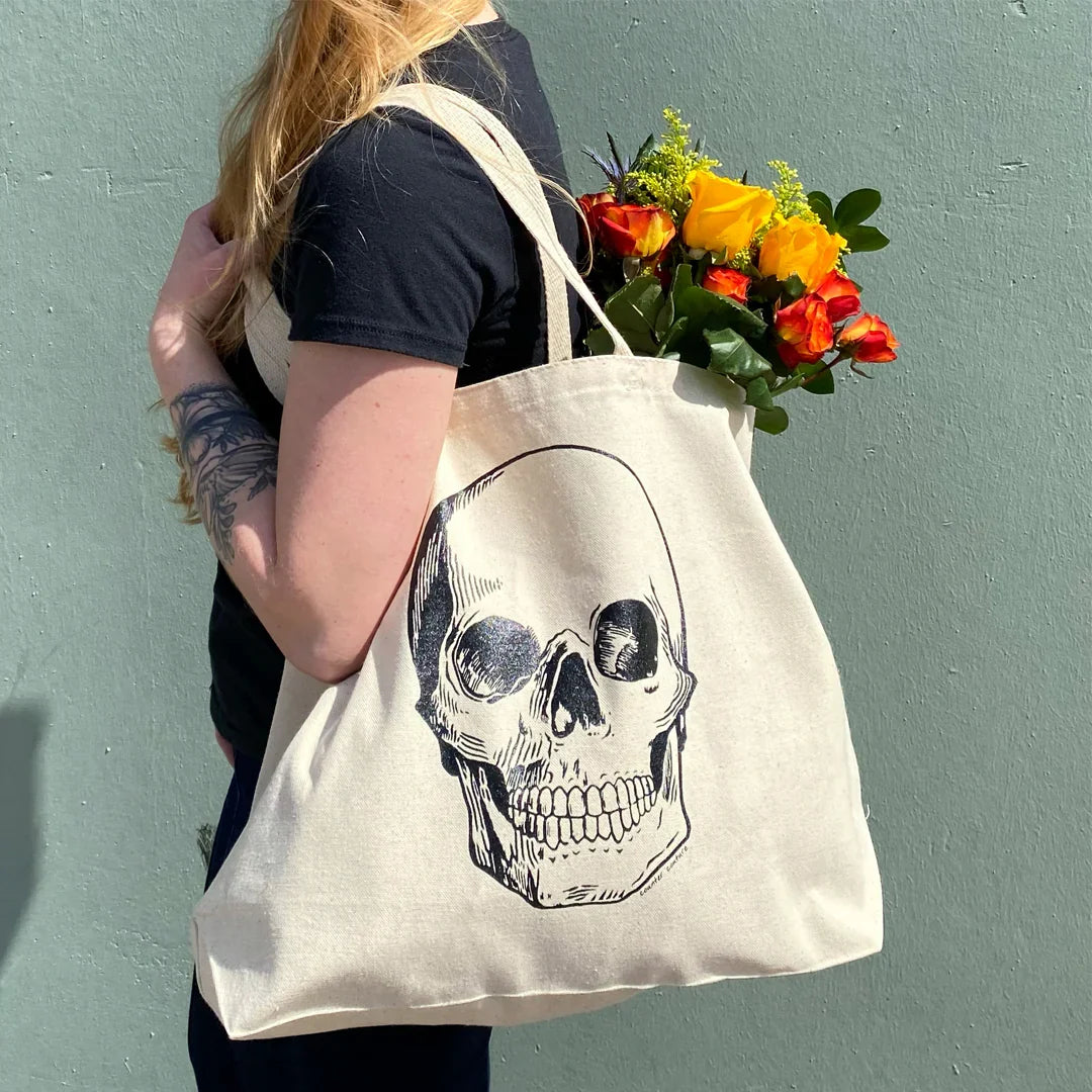 Counter Couture tote bag with leather handles and spacious interior, stylish accessory for everyday use.