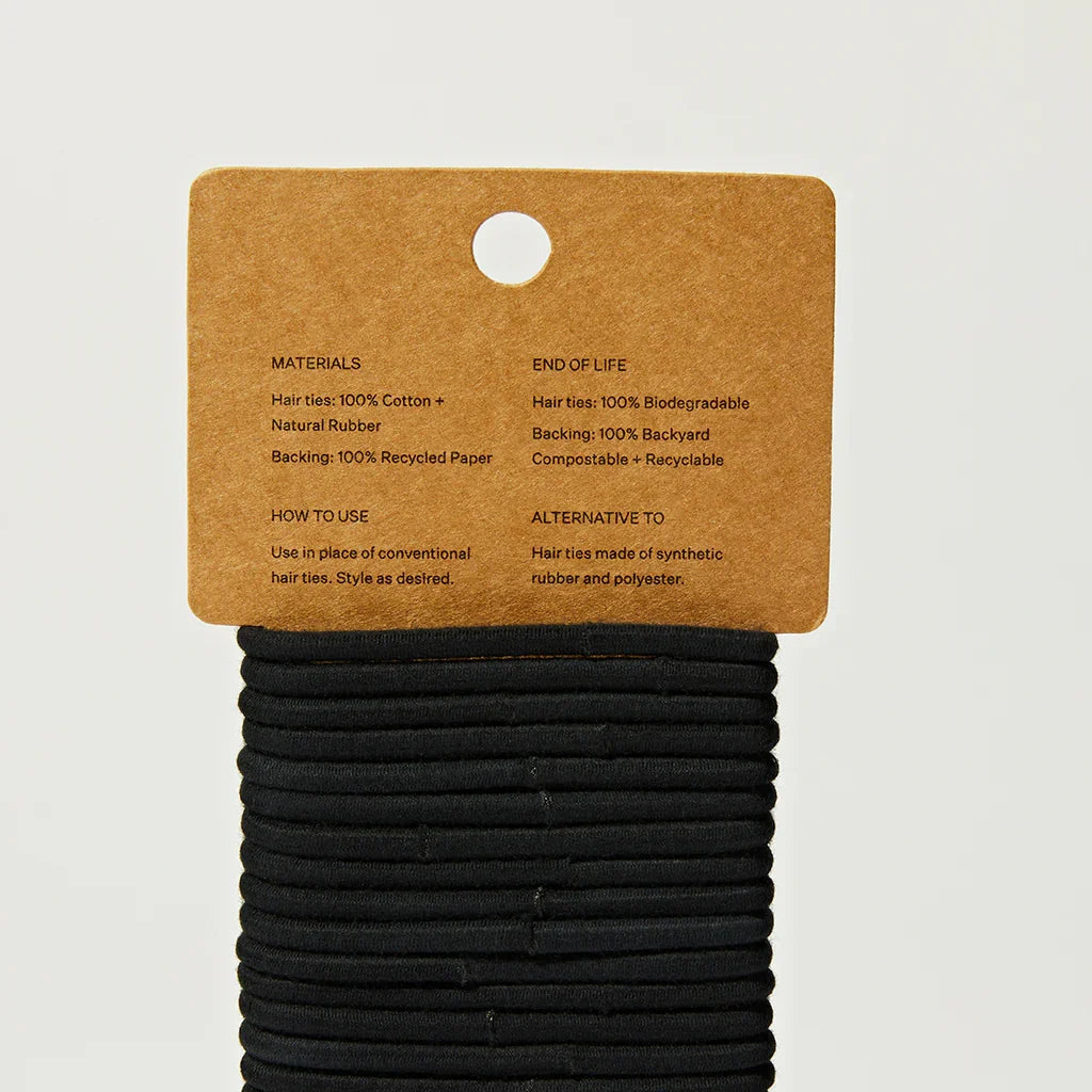 Set of 30 biodegradable hair ties from Package Free, showcasing eco-friendly elastic hair accessories on a neutral background.