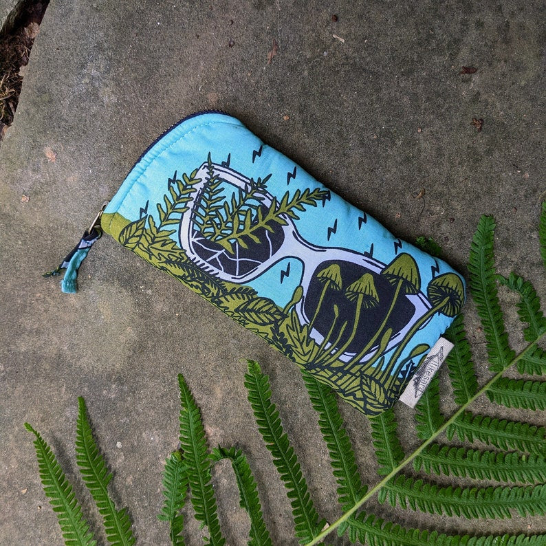 ilikesara zippered pouches in vibrant colors, showing their compact size and durable fabric for organizing small items
