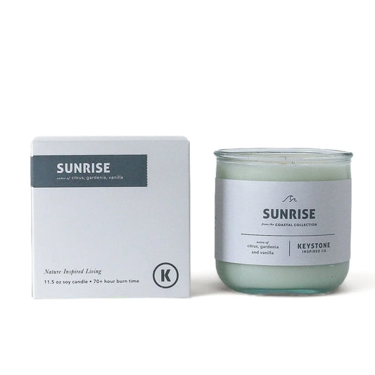 Keystone Inspired 11.5 oz soy candle in clear glass jar, showcasing a cozy, natural wax candle with a single wick.