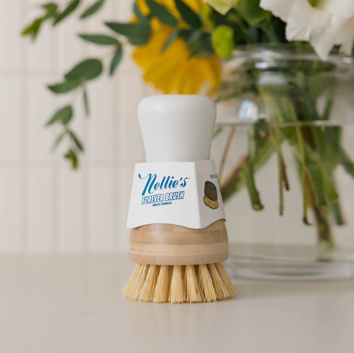Nellie's Forever Brush with natural bristles and wooden handle for gentle cleaning and eco-friendly laundry care.