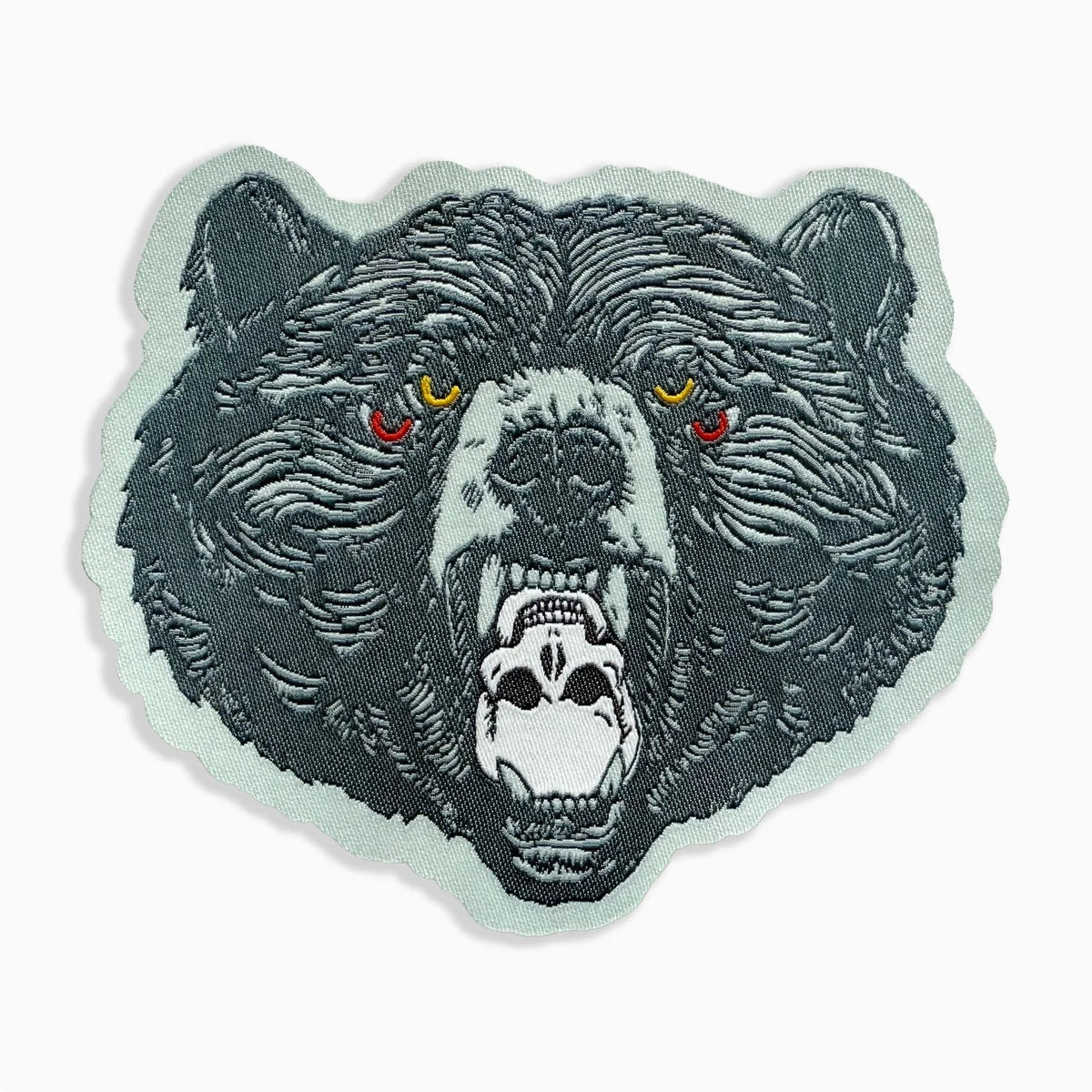 Blackbird Letterpress Patch featuring a stylish blackbird design, perfect for decorating clothing or accessories.