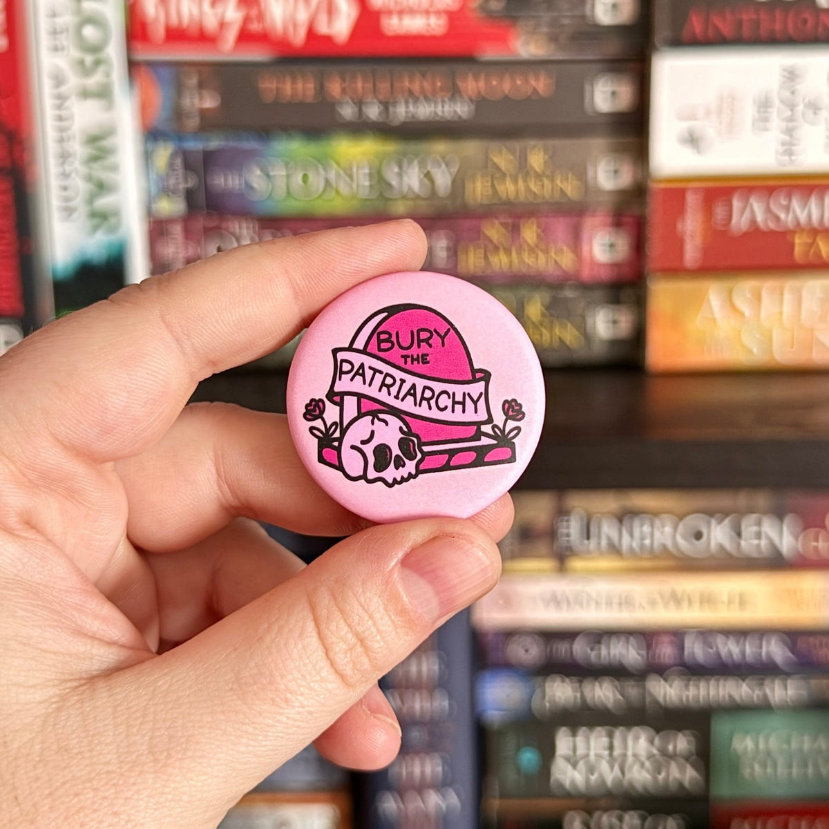 Mourning Breath Button Pin with engraved design, black background, and metal finish, showcasing a symbolic accessory for remembrance.