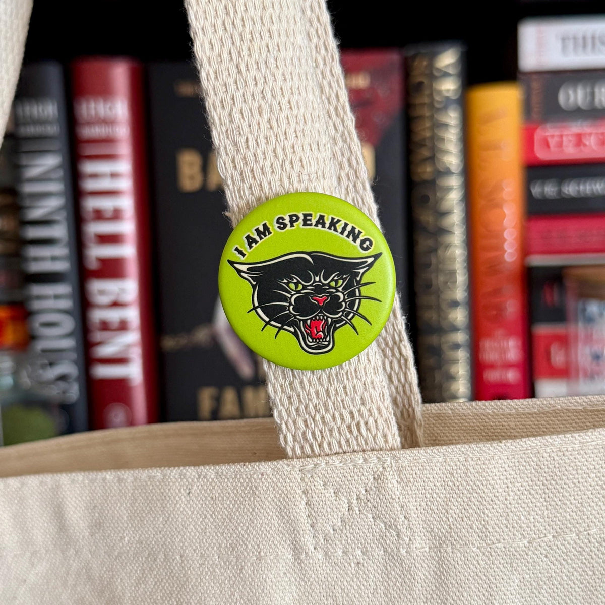 Mourning Breath Button Pin with black and white design, featuring a somber motif, on a plain background.