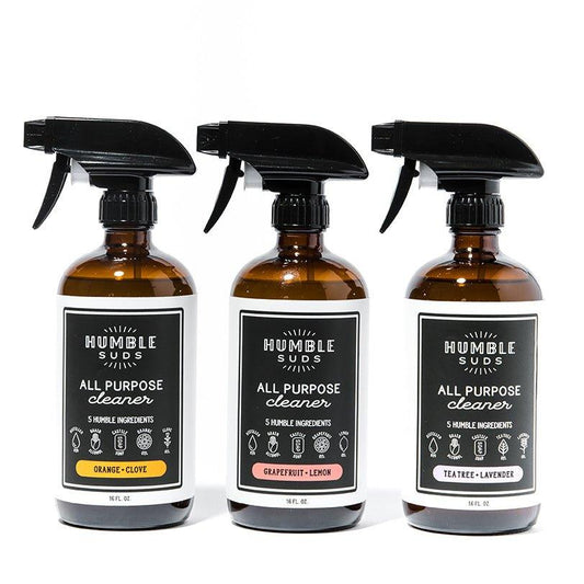 Humble Suds all-purpose cleaner in a 16oz glass spray bottle, ready for cleaning surfaces with a spray nozzle.