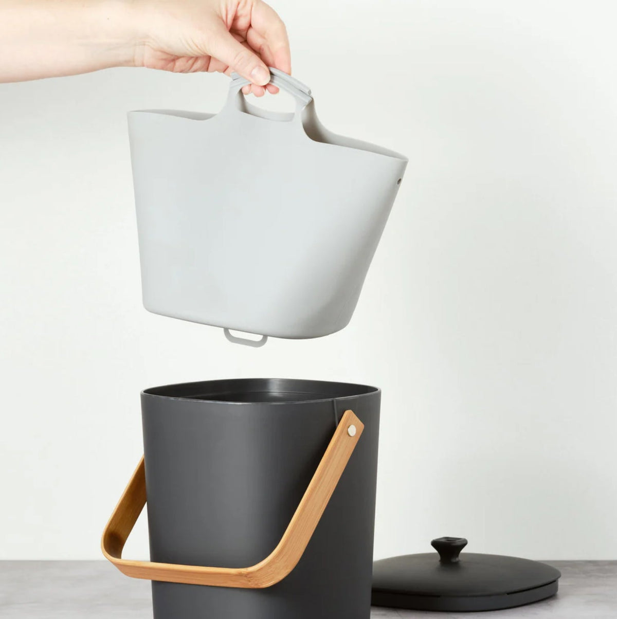 Silicone compost bin liner by Bamboozle shown in the image, flexible and durable lining for eco-friendly waste disposal.