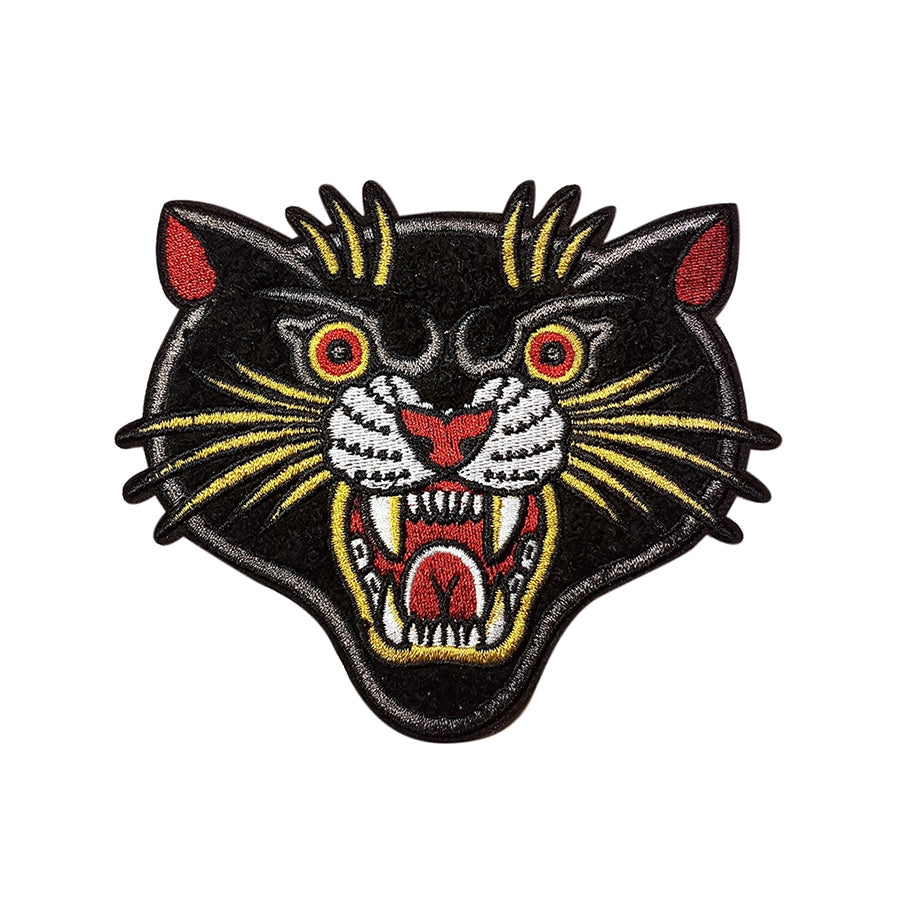 Stuntin’ Goods patches featuring bold designs, displayed on a white background, showcasing various colorful embroidered patches.