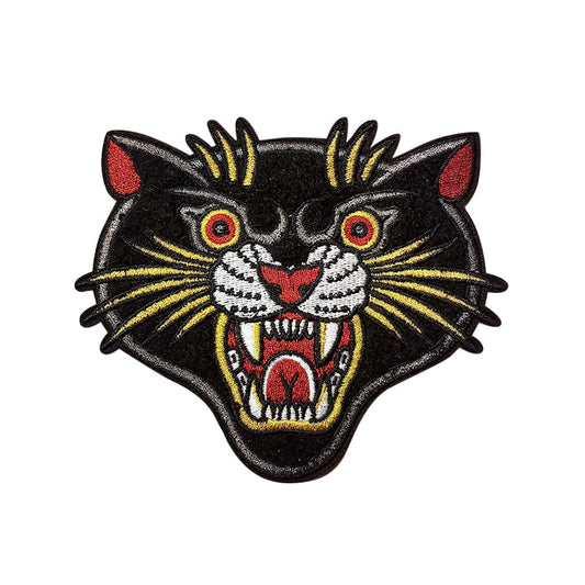 Stuntin’ Goods patches featuring bold designs, displayed on a white background, showcasing various colorful embroidered patches.