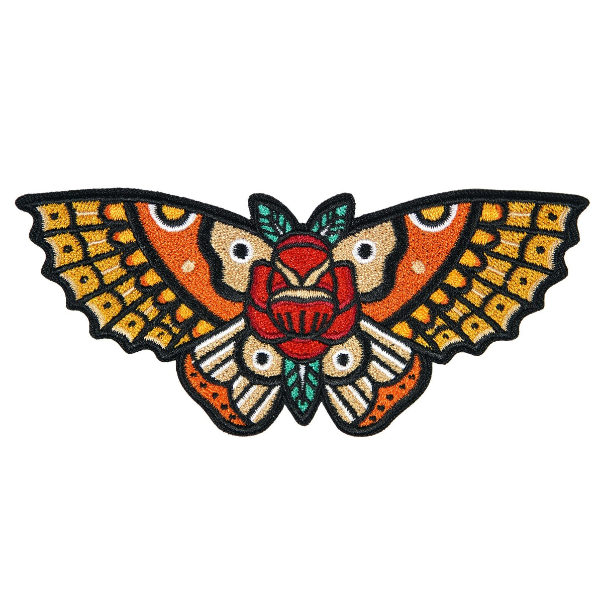 Close-up of Stuntin’ Goods patches featuring bold embroidered designs on colorful fabric for clothing customization.