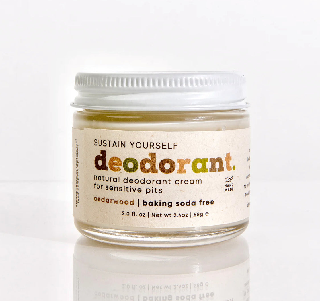 Sustain Yourself 2oz glass deodorant cream jar with white lid, showing the natural deodorant product in a clear container.