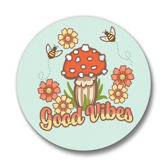 Two Little Fruits Buttons featuring colorful fruit designs on a white background, perfect for clothing or accessories.