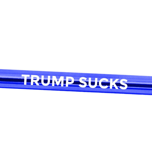 Stainless steel straw with engraved "Trump Sucks" message from Shuki, designed for reusable drinking and eco-friendly use.